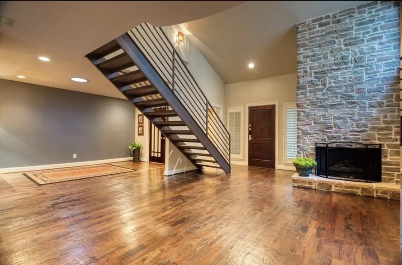 Please note the size and ceiling height in this gorgeous living area with floor to ceiling fireplace. This is a gas fireplace. All utilities are handled by the tenant.