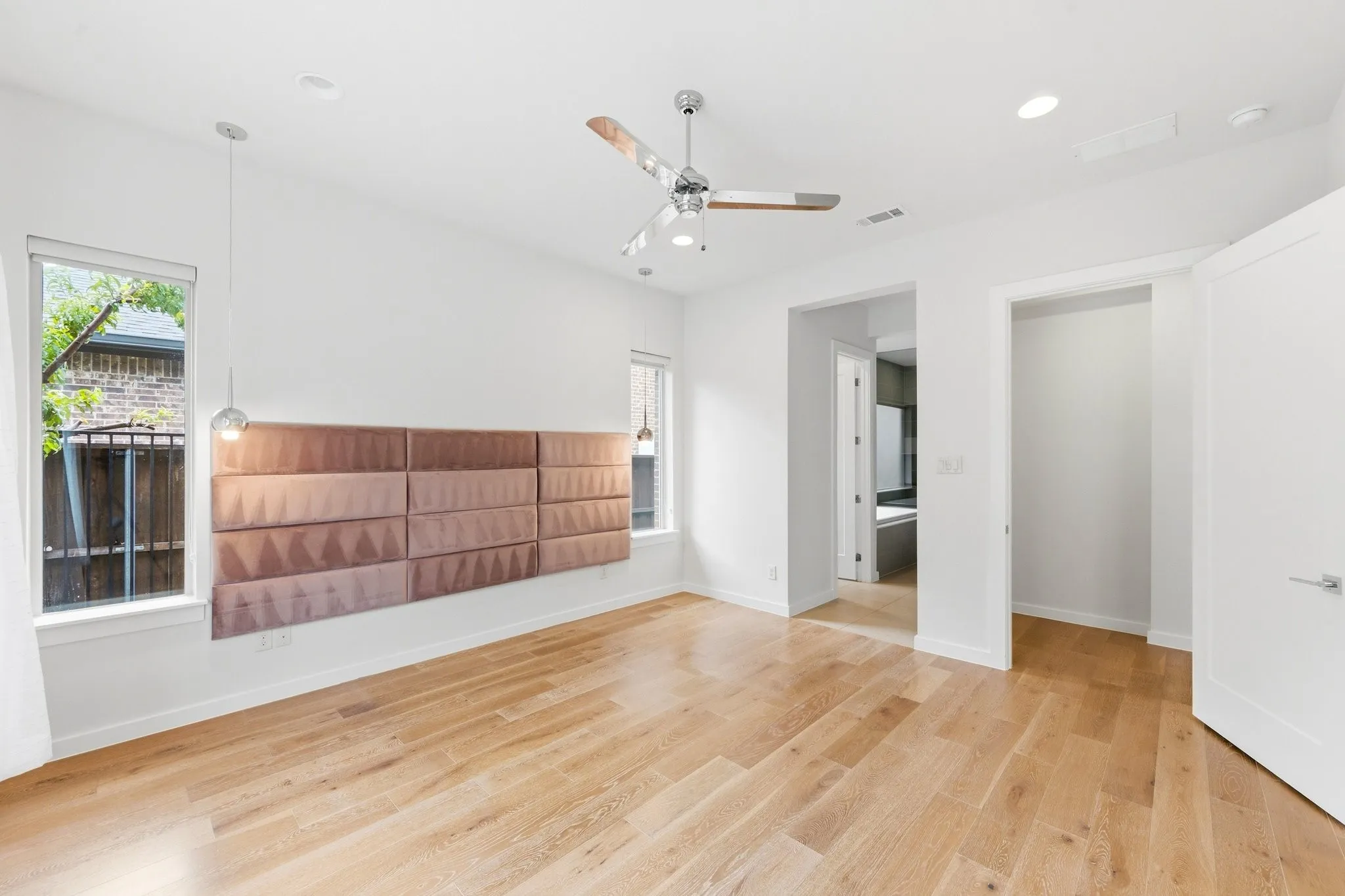 Spacious main-floor primary retreat positioned for maximum privacy away from upstairs living.