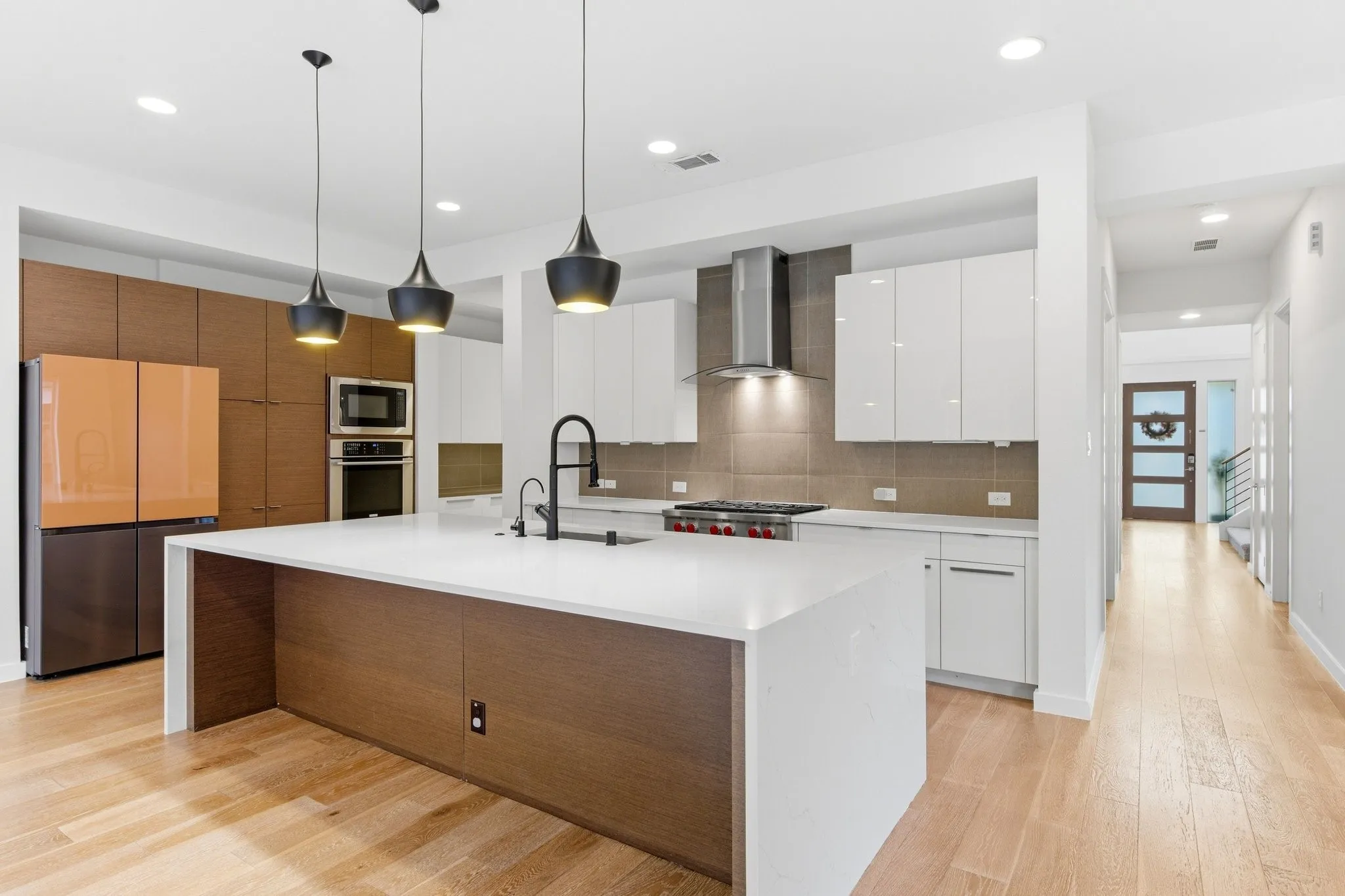 Ideal layout for effortless entertaining, connecting the chef's space directly to the main dining room.