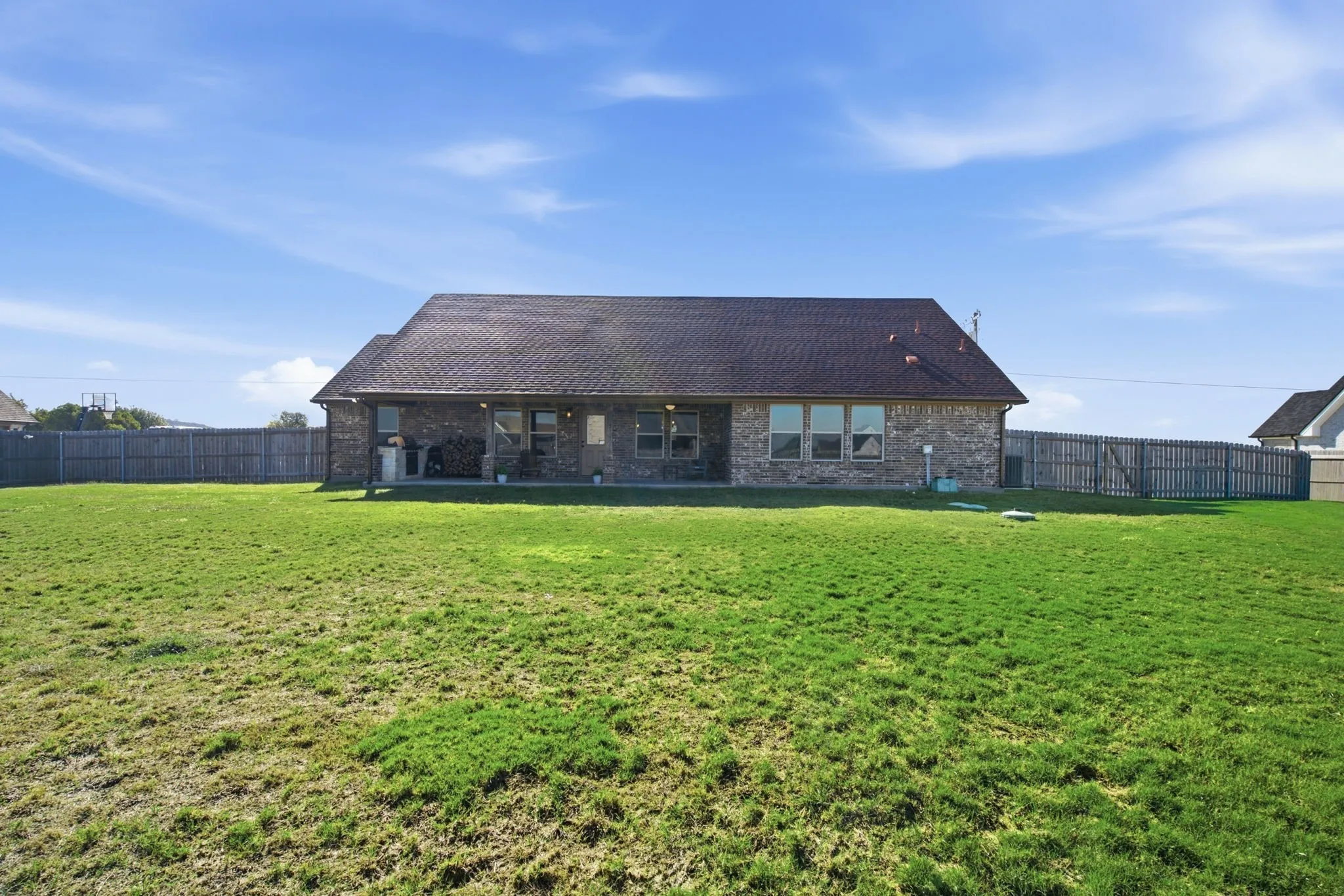 Expansive backyard with a full privacy fence