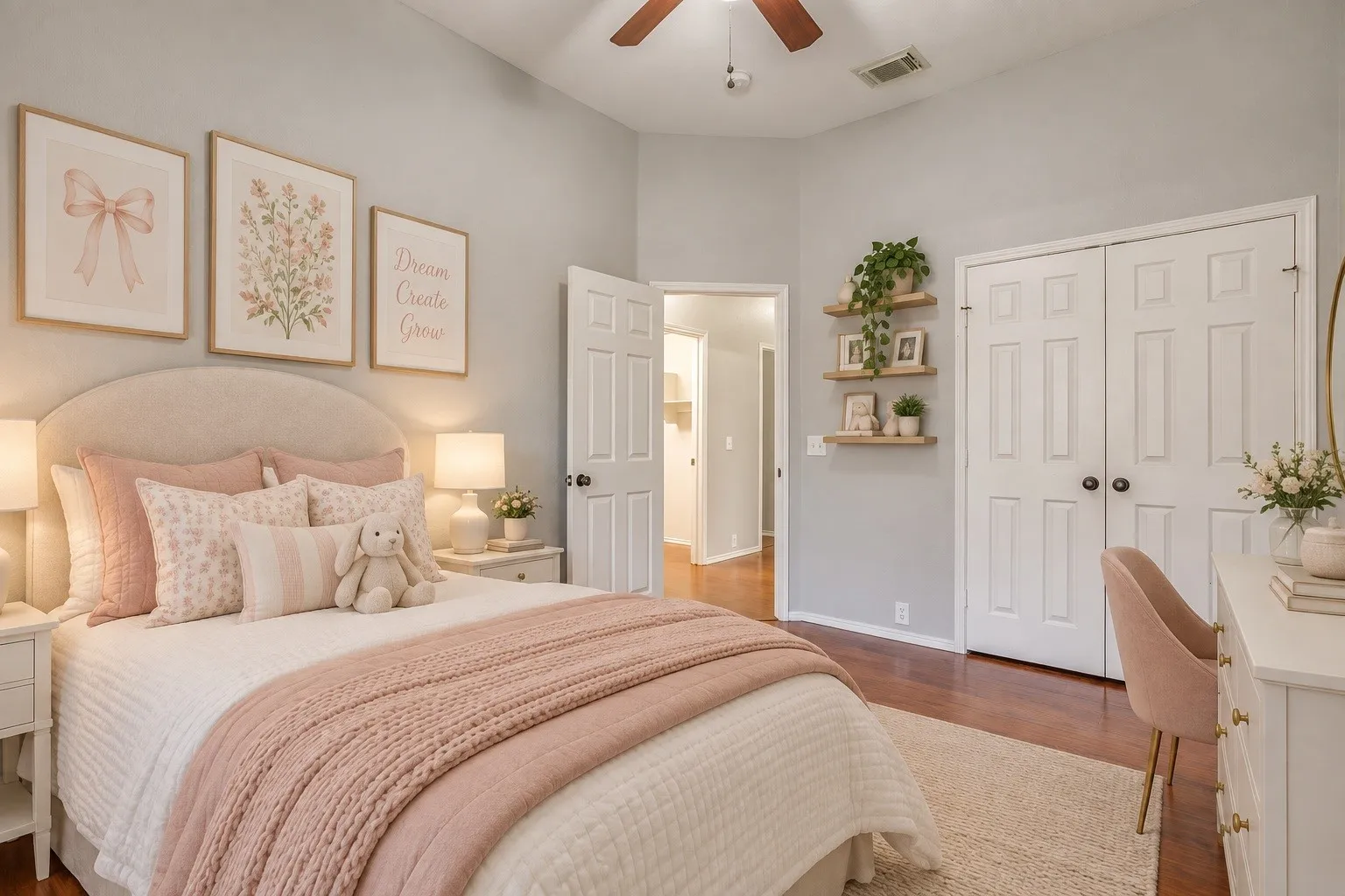 Vaulted ceiling with a ceiling fan, wood-finish flooring, white paneled bifold closet doors, and light gray wall paint. This photo has been virtually staged using AI.