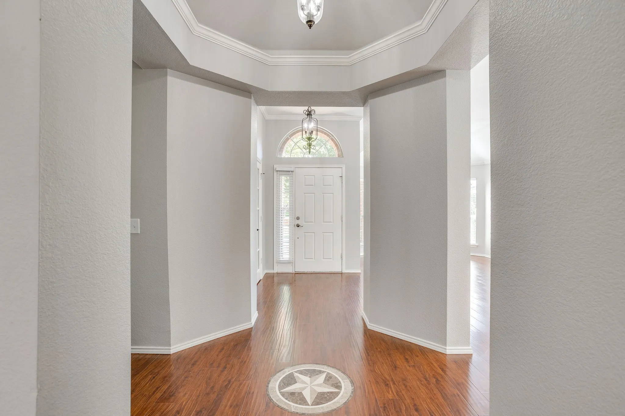 Wood-finish flooring with central medallion inlay