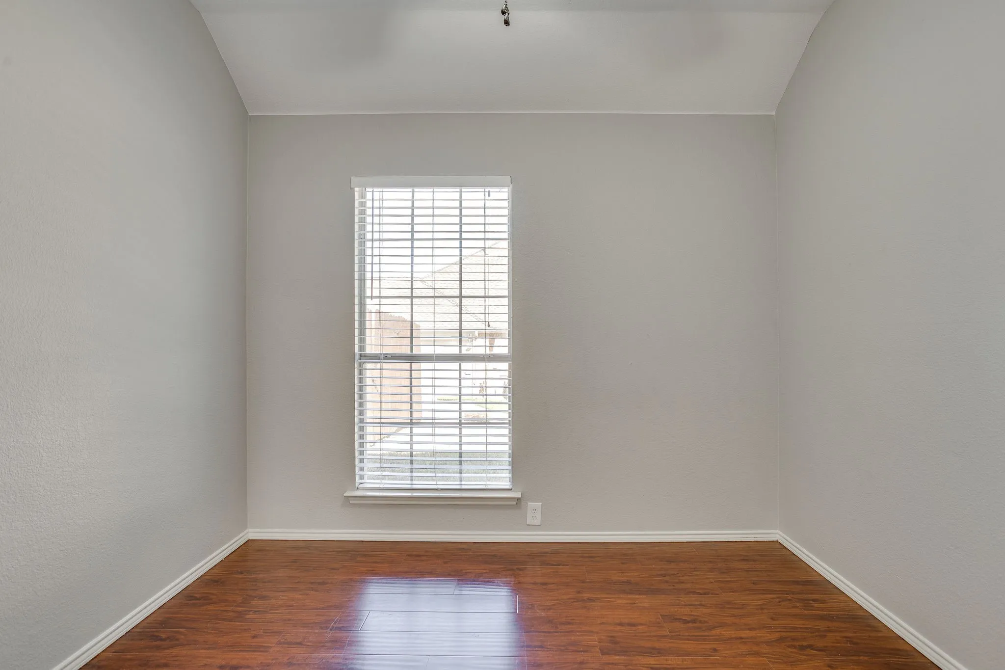 Wood-finish flooring with white trim