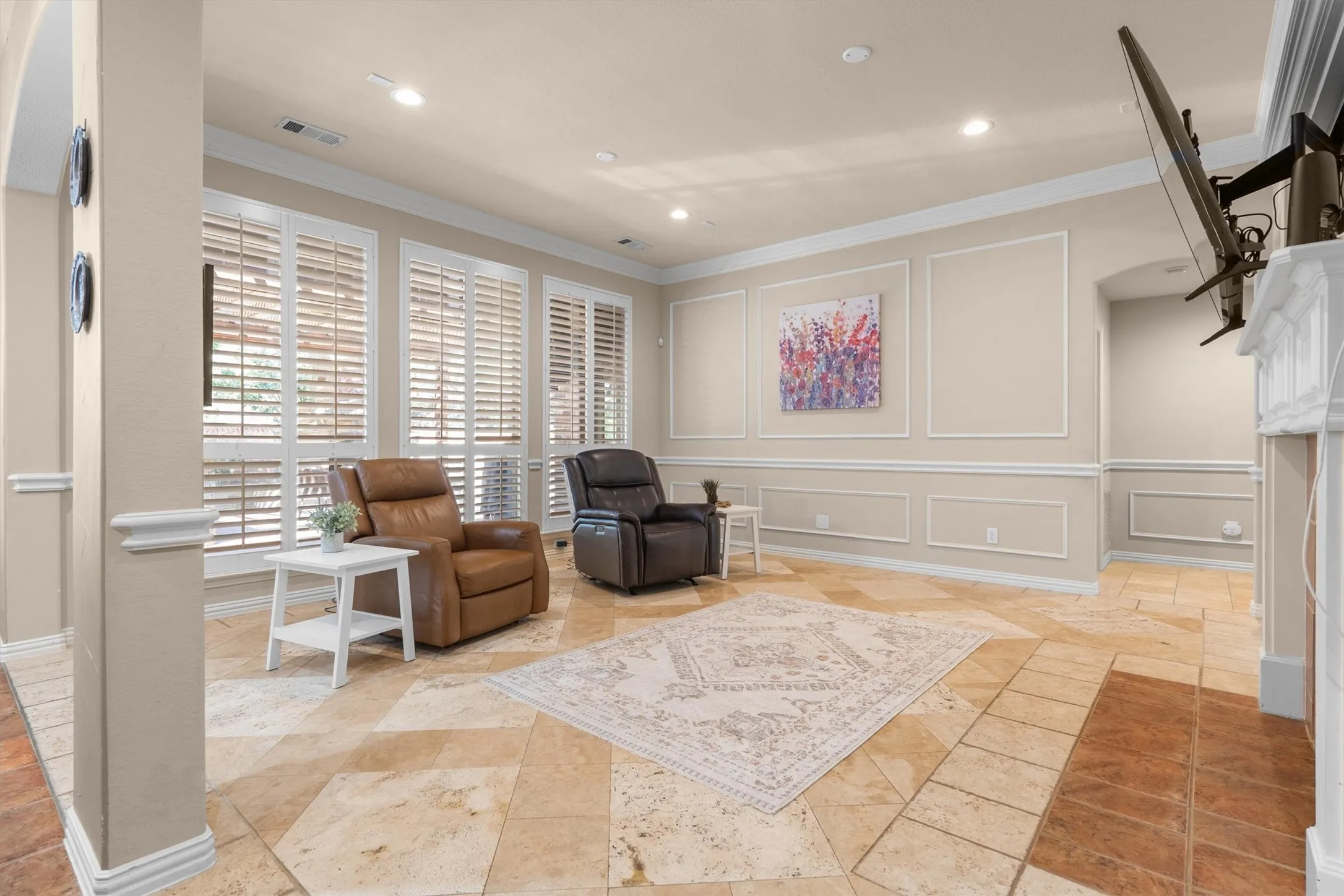 Recessed lighting, crown molding, decorative wall trim, shuttered windows, and tile flooring