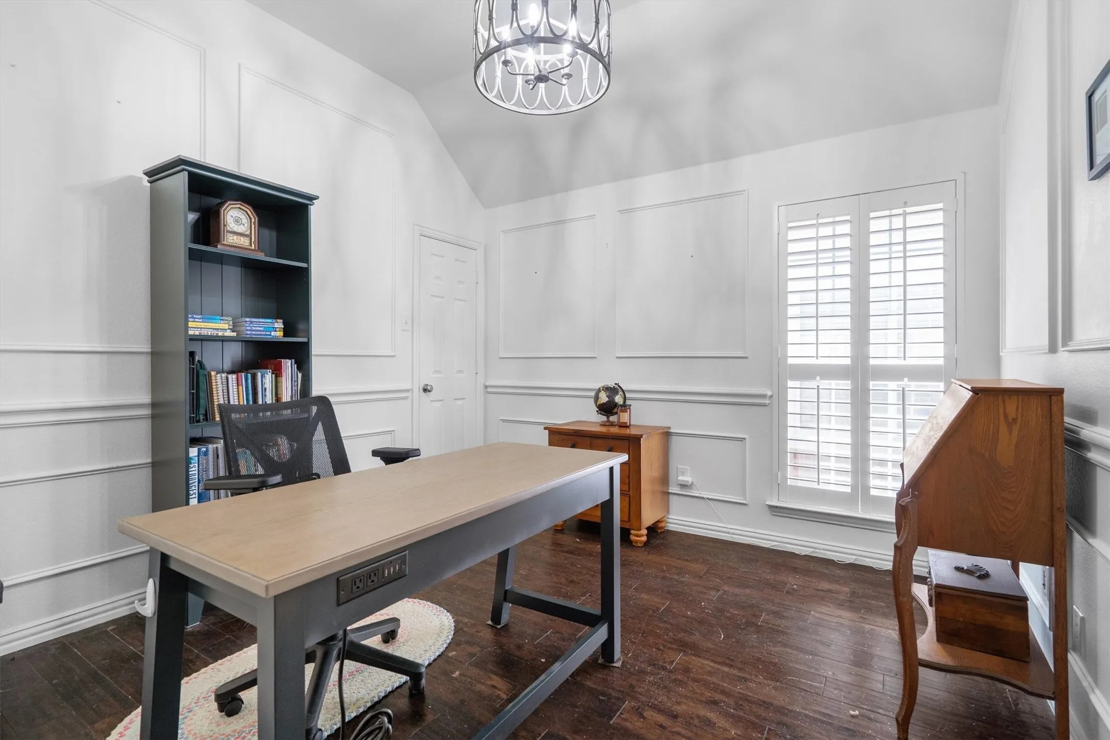 Wood-finish flooring with wainscoting and crown molding