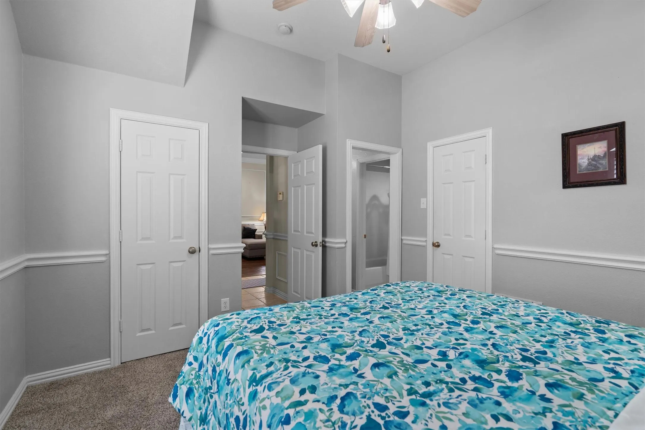 Wall-to-wall carpeting and neutral wall tones