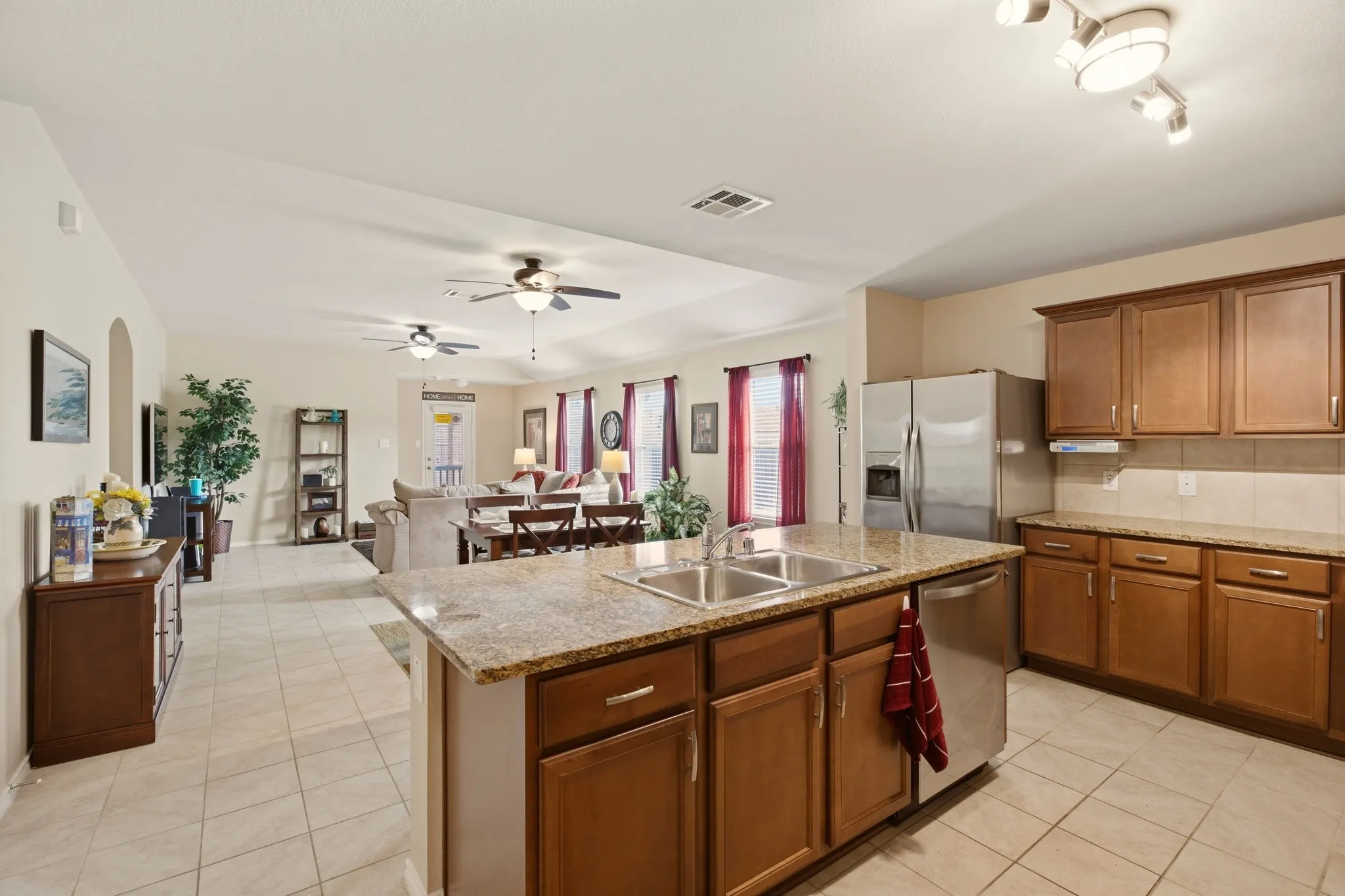 A popular DRHorton floorplan notable for its seamless flow from kitchen to dining to living room--ideal for families & entertaining.
