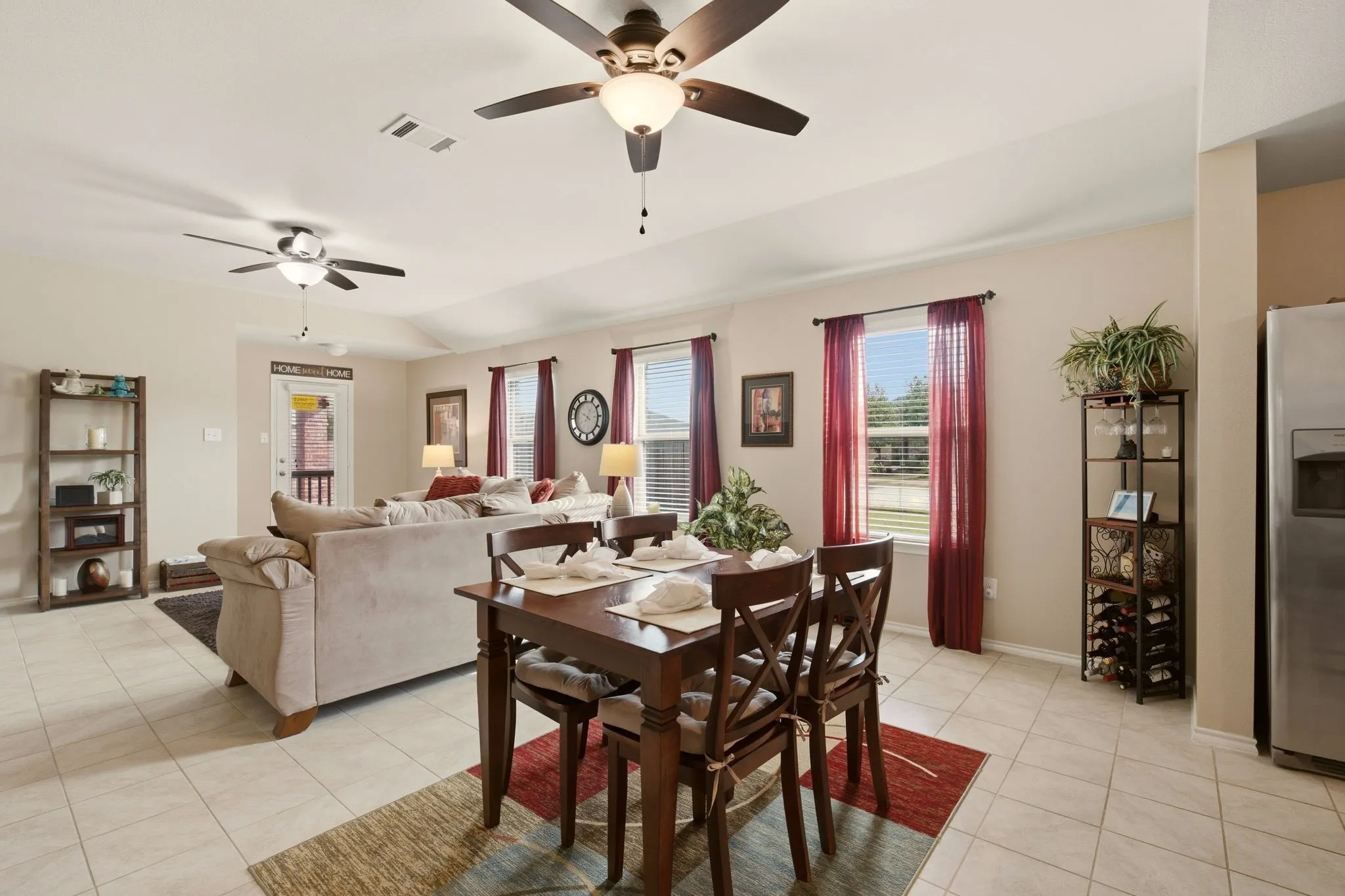 Picture windows add so much natural light + no neighbor beside this home to block the light either.  Any table shape works well in this floating dining space.