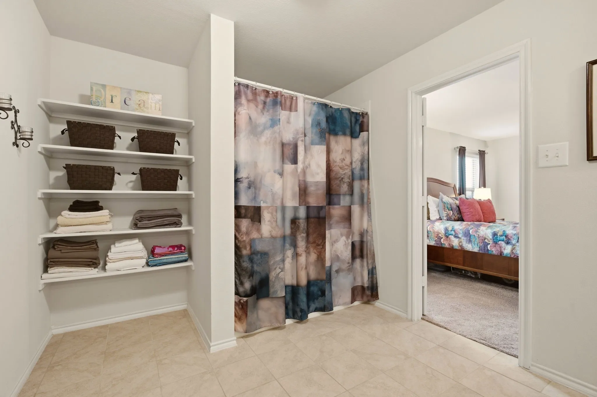 Built-in storage & a walk-in shower in the primary bath.