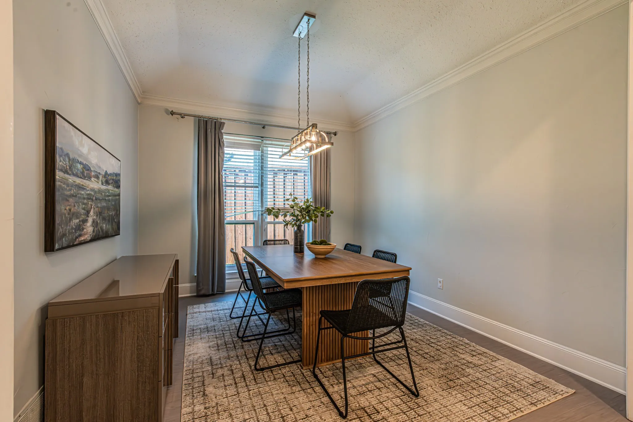 Crown molding, recessed window, and contemporary linear chandelier