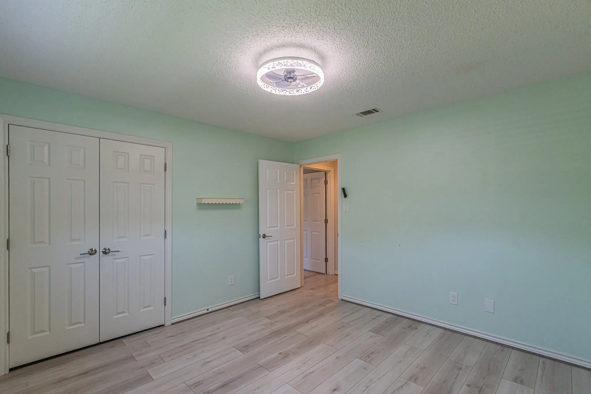 Wood-finish flooring throughout