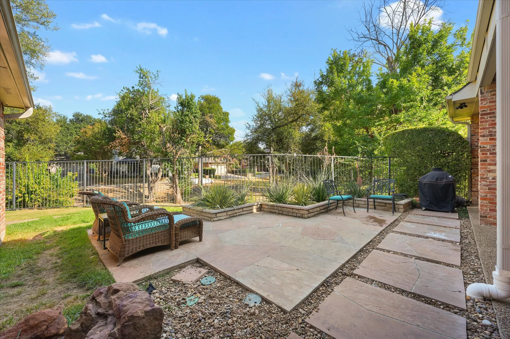 Enjoy morning light and an open greenbelt outlook from the rear patio.