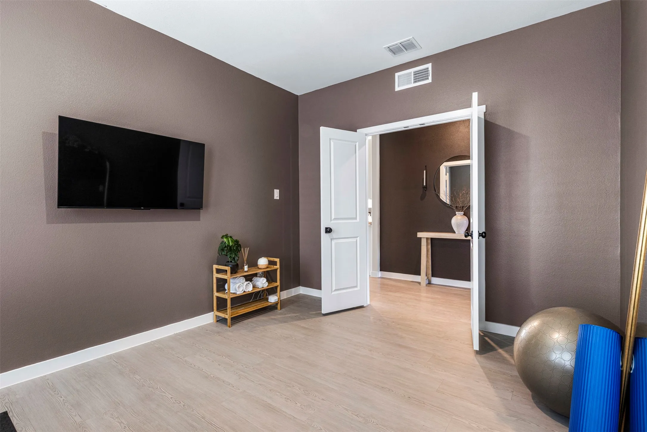 Wood-finish flooring with crisp white trim