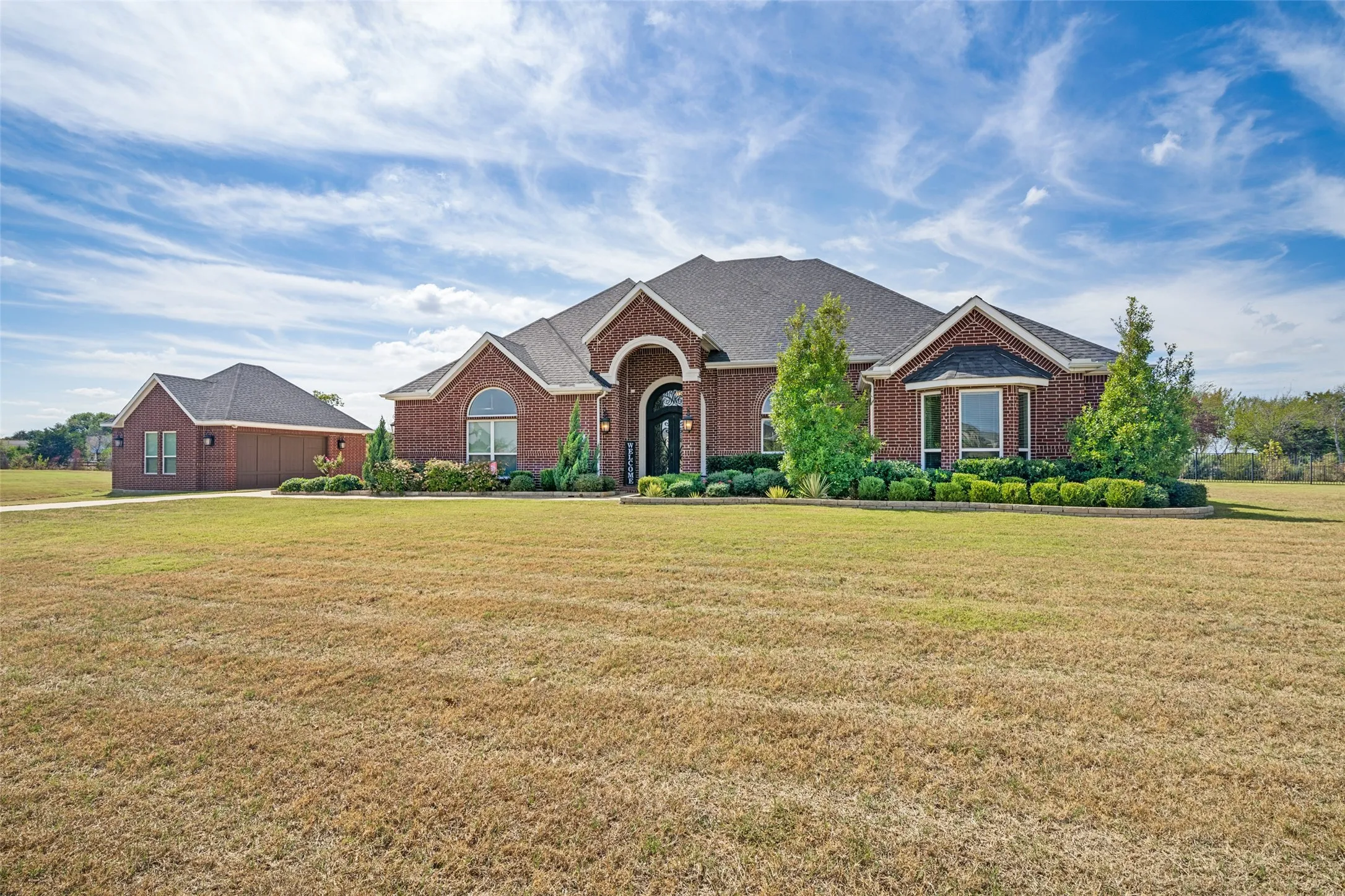 Beautiful home with attached 3 car garage and detached 2.5 car garage