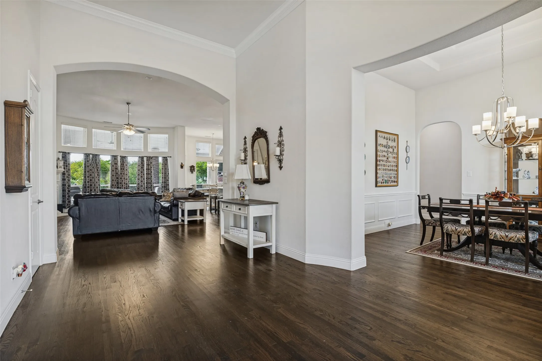 Entry over looking dining and family rooms.  Crown molding and beautiful hardwood floors.