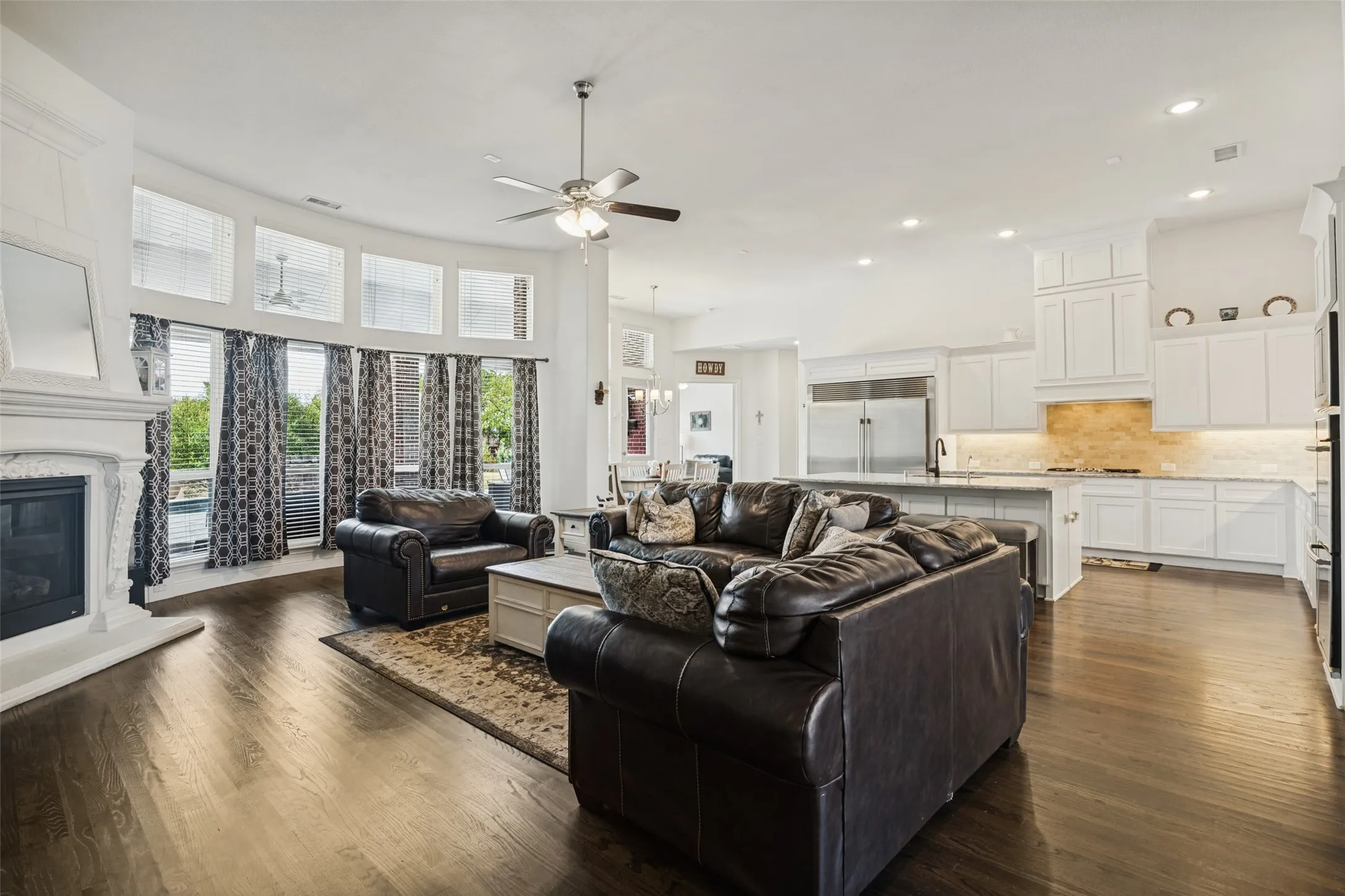 Open concept kitchen over looking family and breakfast room.