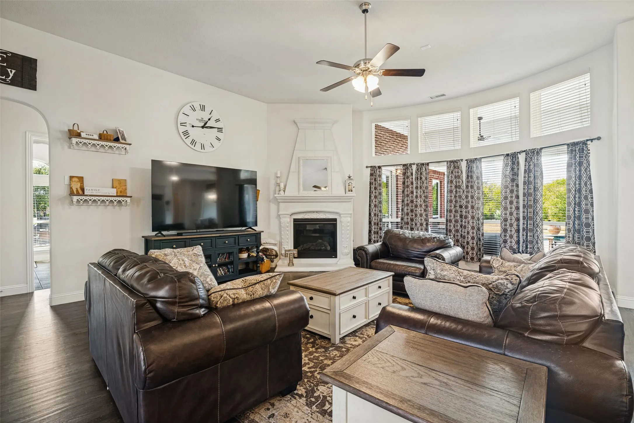 Family room with circular bay window over looking pool and yard