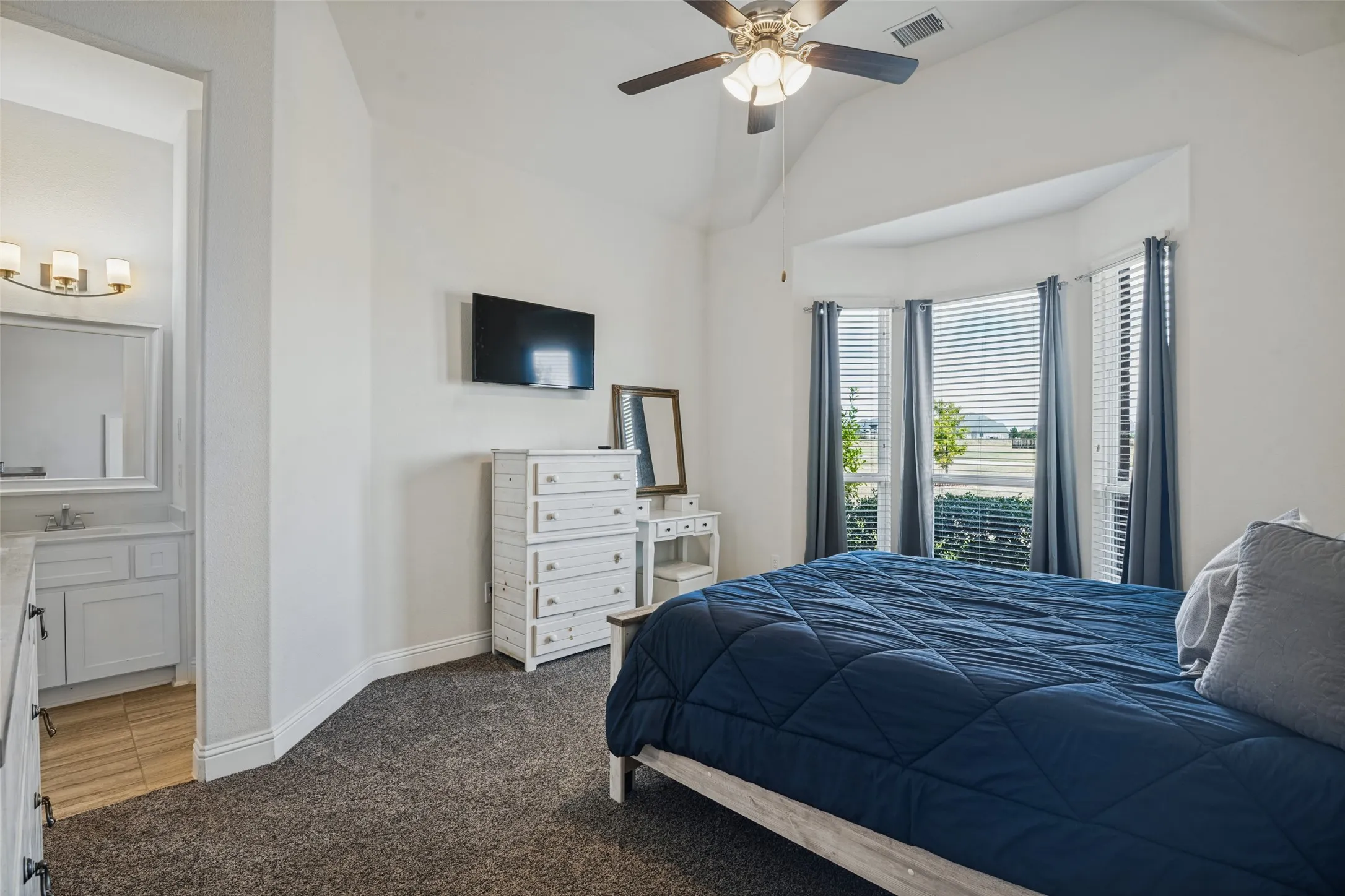 Secondary bedroom with bay window.
