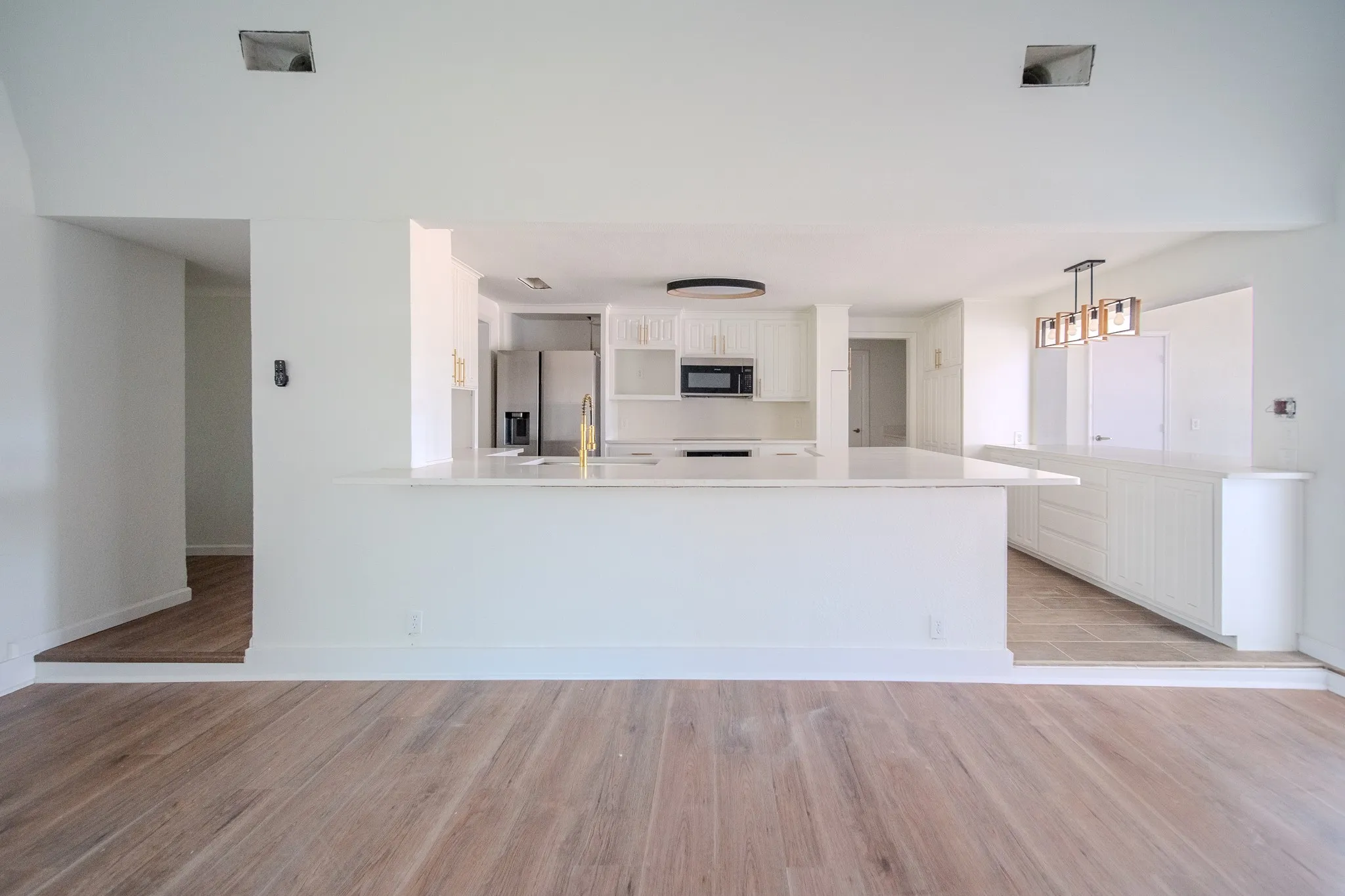 Wood-finish flooring throughout the foreground