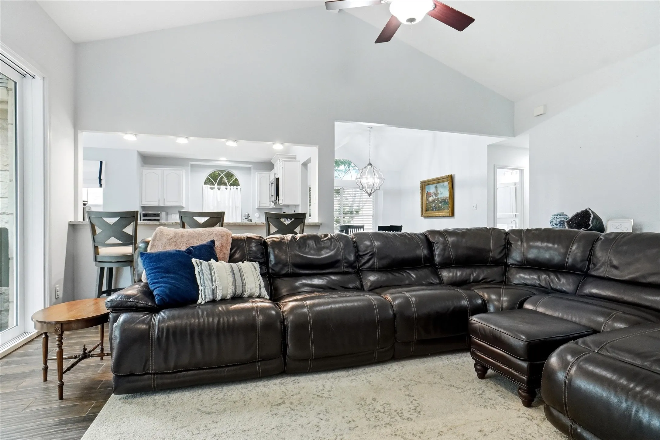 Open Concept for family gatherings and entertainment.  Vaulted ceiling includes a fan
