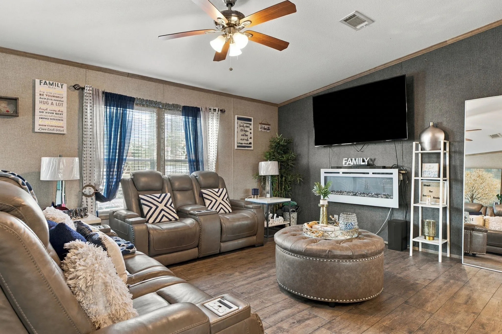 Wood-finish flooring with a ceiling fan light fixture