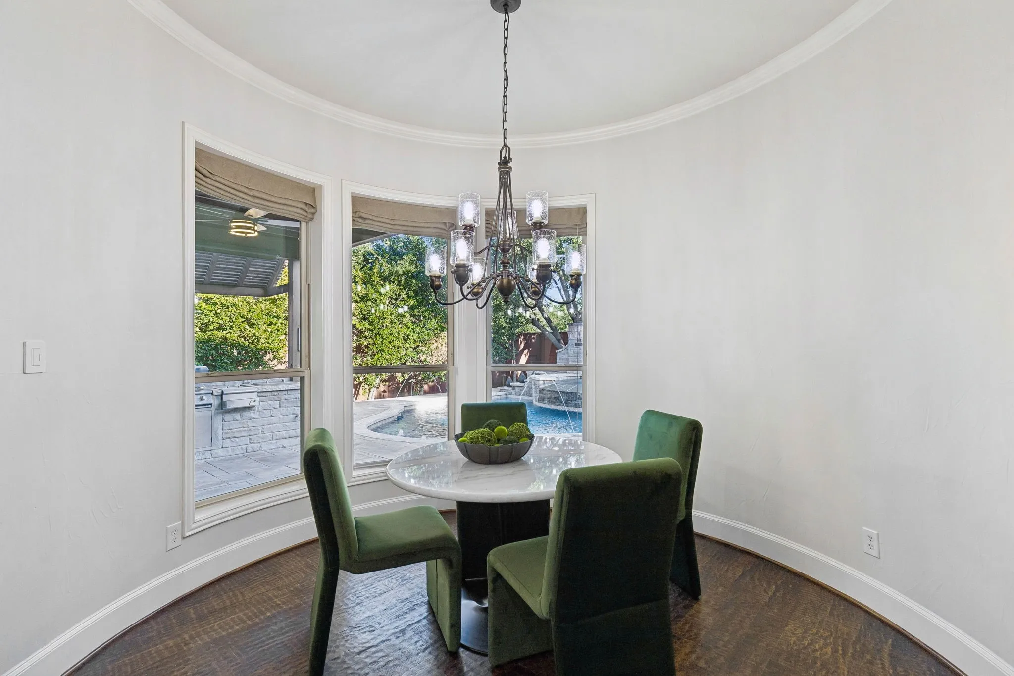 Breakfast area overlooking custom designer pool