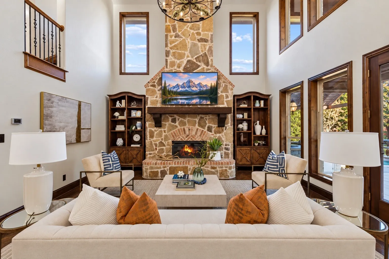 Living room with stunning floor to ceiling stone fireplace