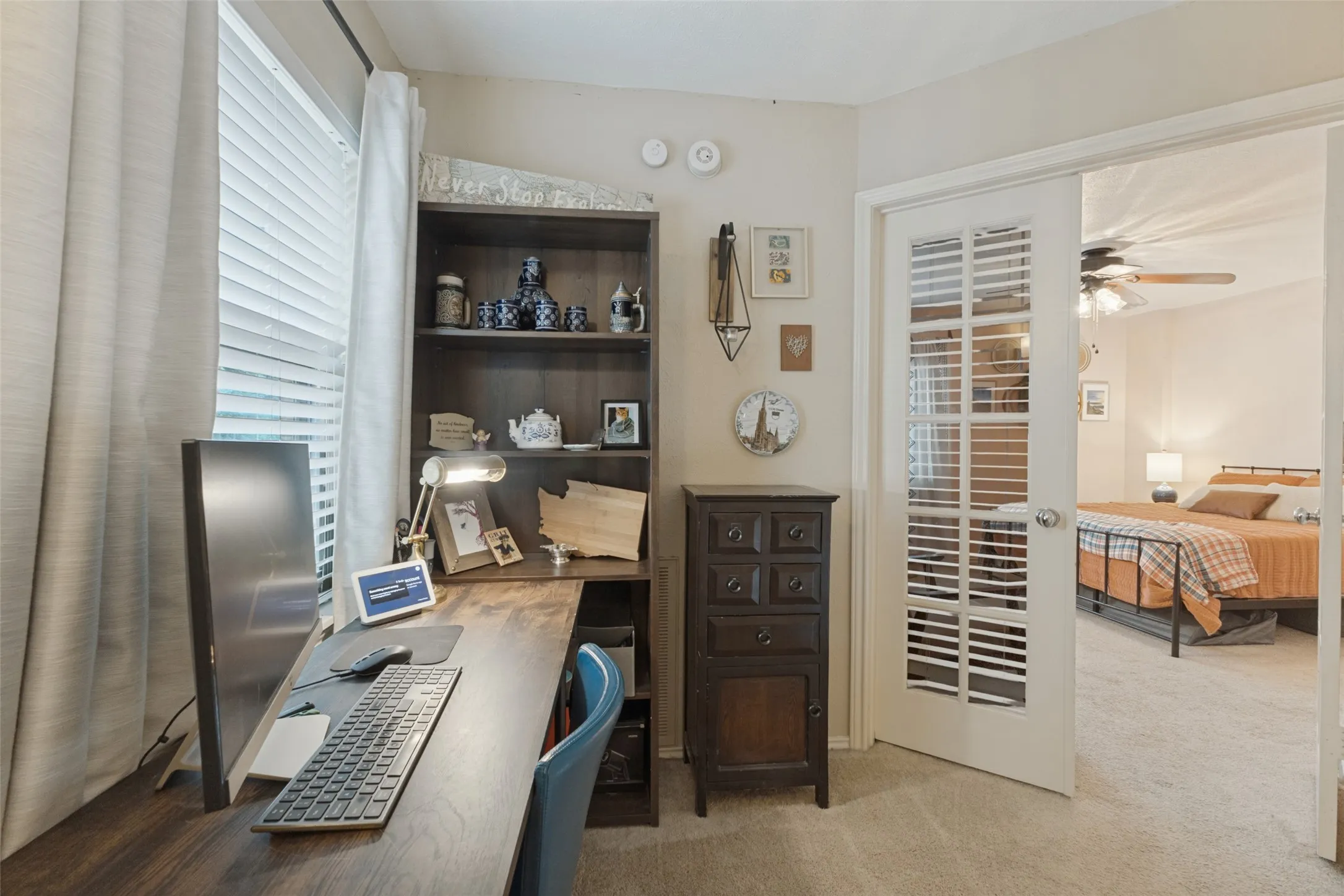 Office nook/loft area at the top of the stairs.