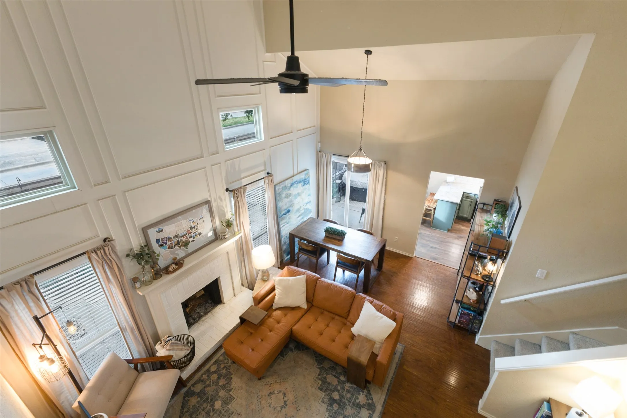 View of living area from upstairs loft.