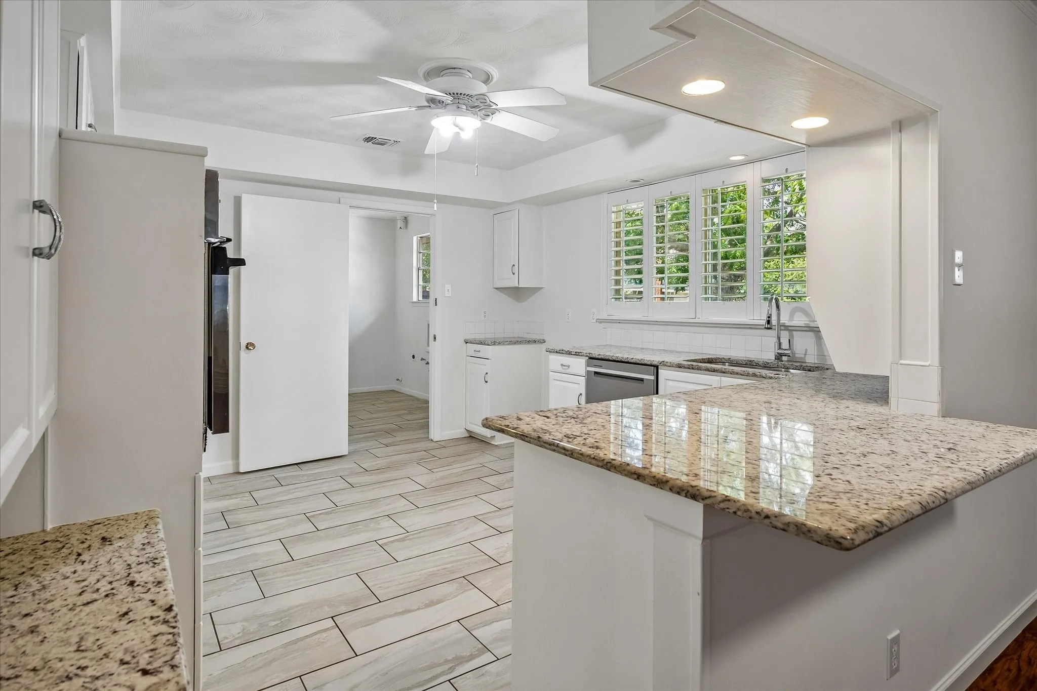 Kitchen connects directly to the laundry room which features a large pantry.