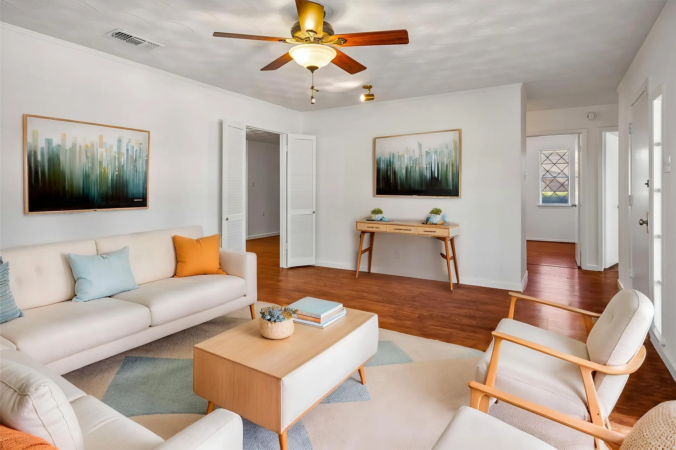 VIRTUALLY STAGED to show multiple set ups -- Recessed ceiling light, ceiling fan with integrated lighting, vinyl wood-look flooring, white walls and white trim throughout