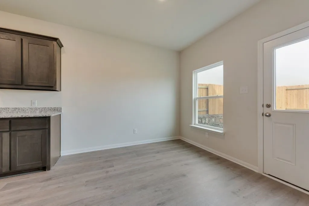 Wood-finish flooring with light-toned walls