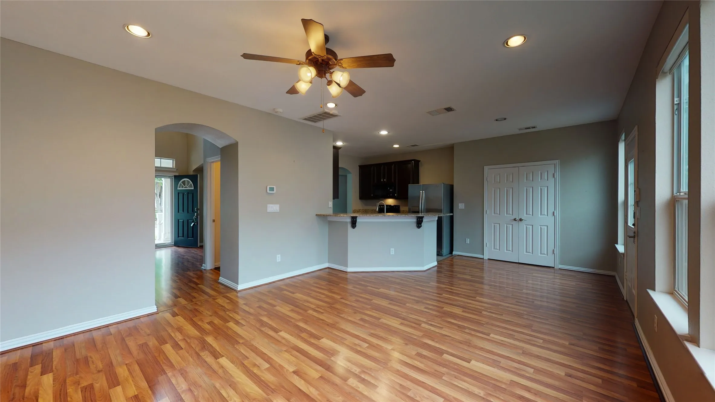 Kitchen is open to the living room and there is an eat in space.