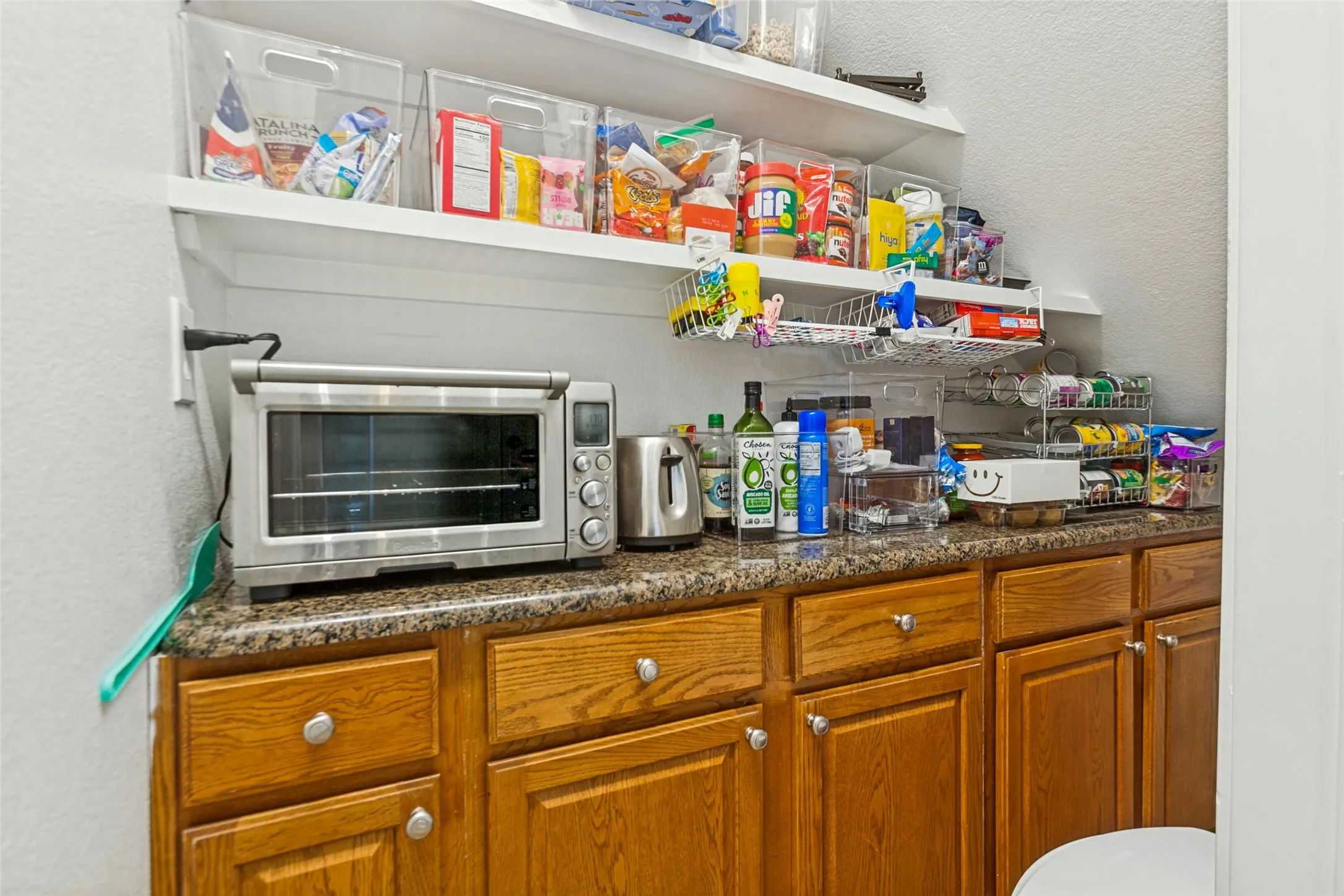 Custom built out butlers pantery providing ample storage