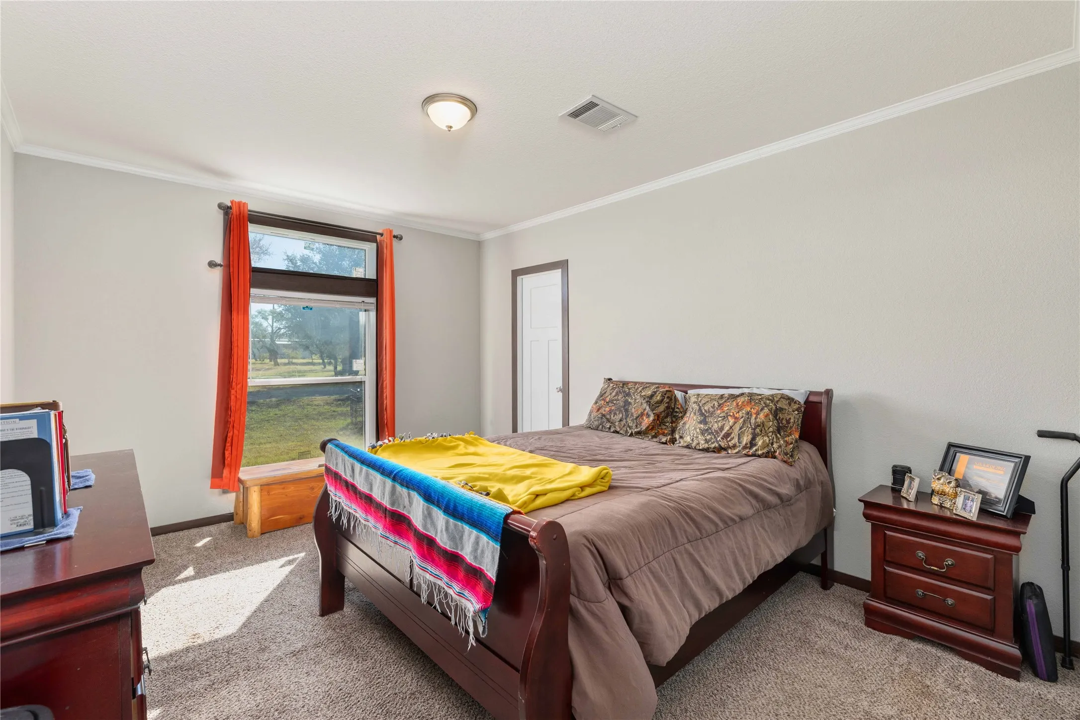 Wall-to-wall carpeting and neutral wall tones
