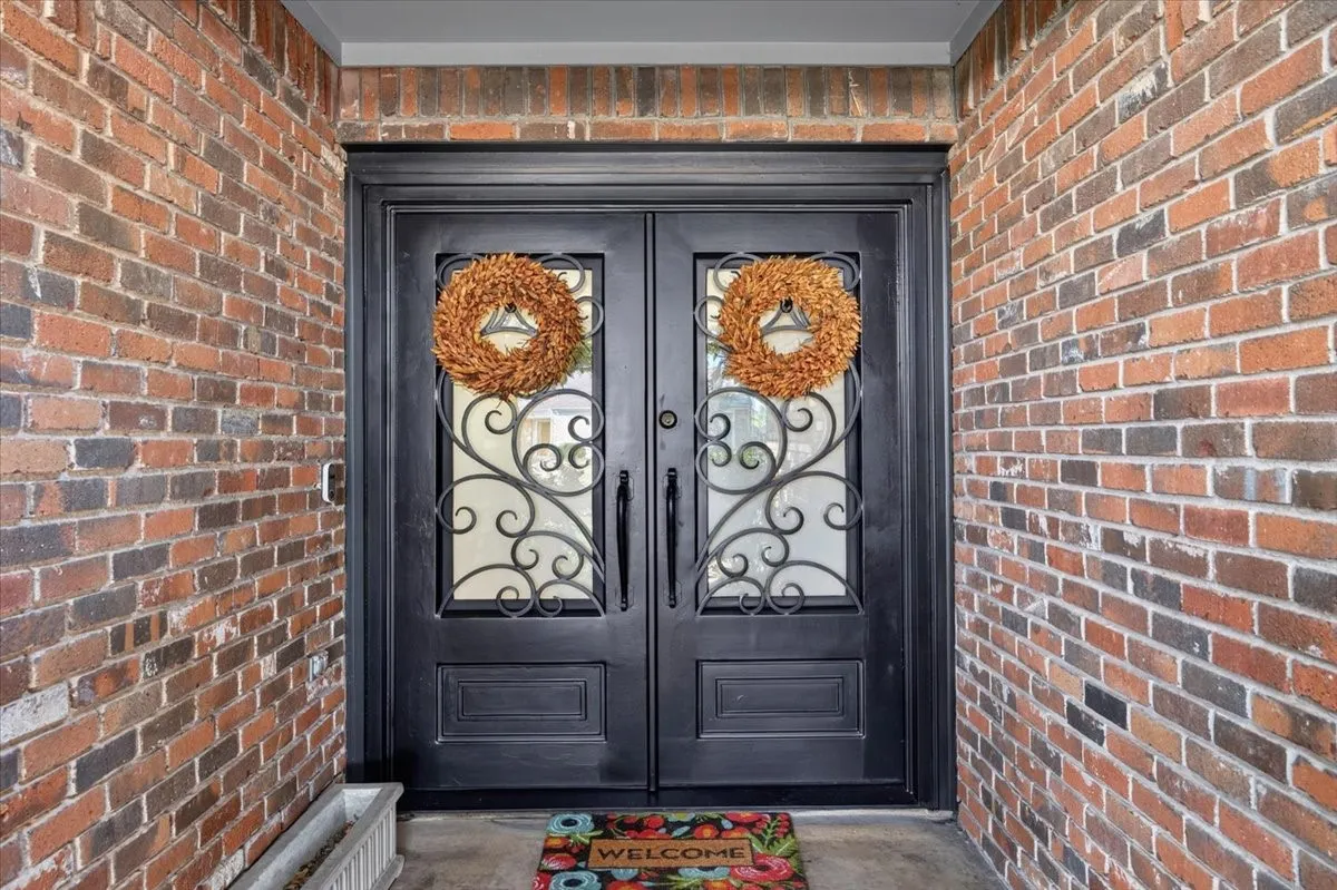 Two iron entry doors.