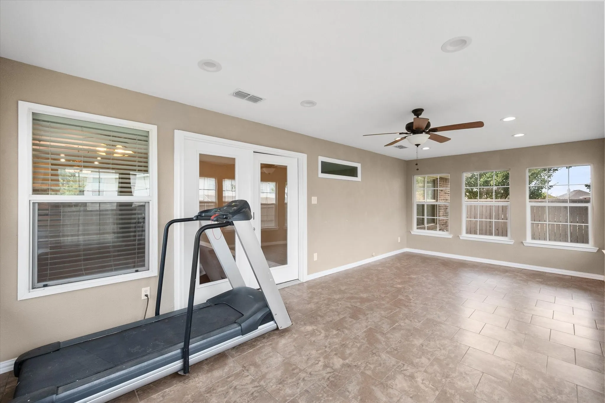 Versatile bonus room.  Exercise-play room-craft room- game room.  Fully air conditioned.