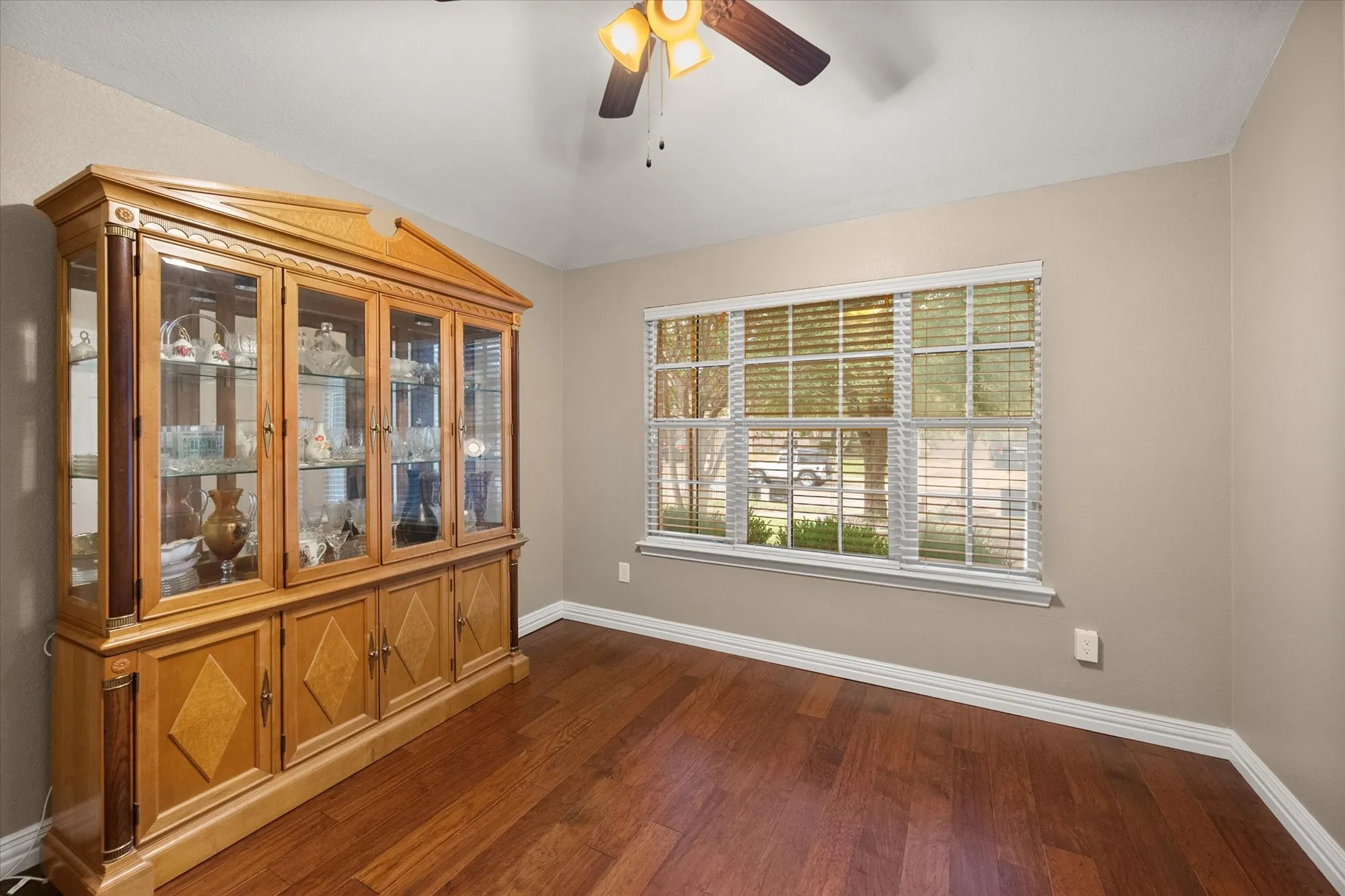 Features wood flooring and view to front of house