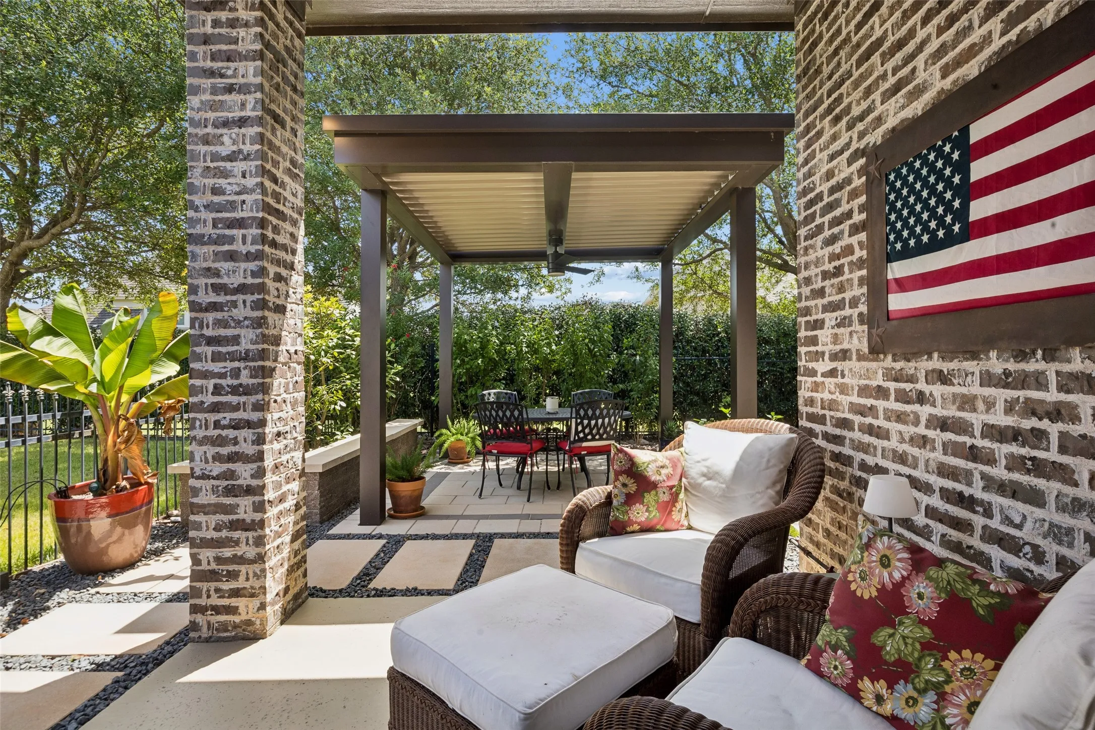 Backyard retreat has several sitting areas.