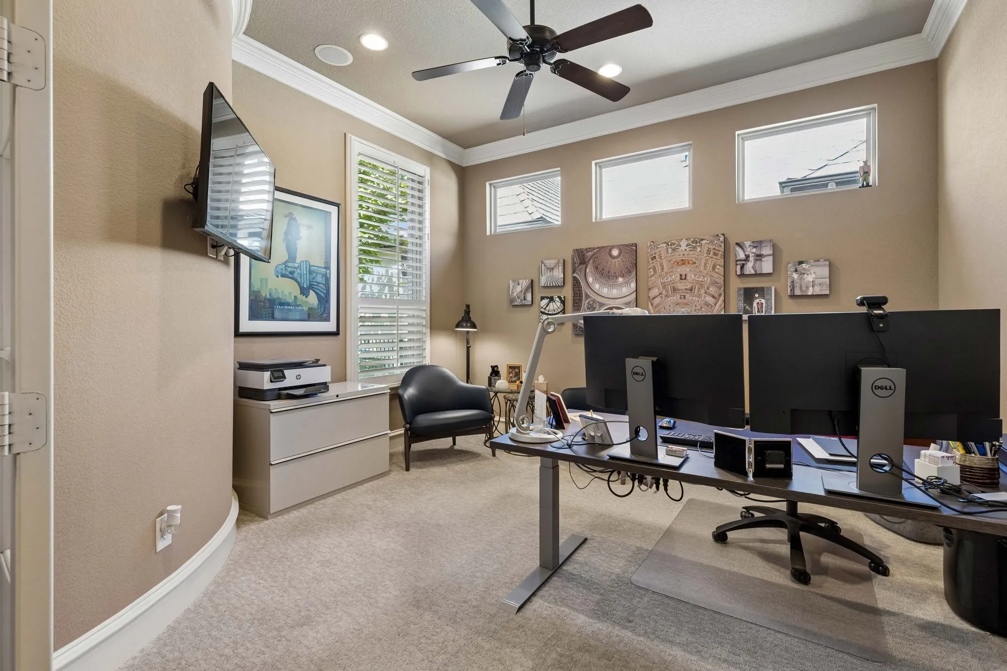 A private office or secondary living area overlooks the front courtyard.