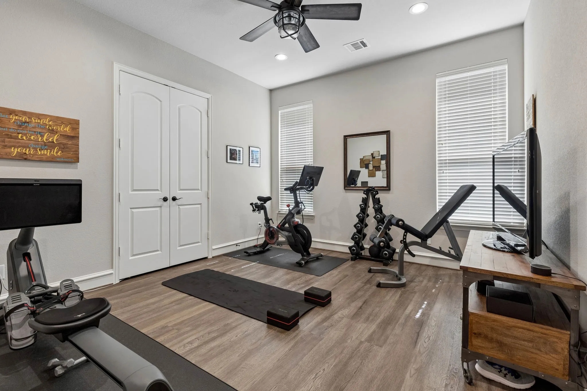Secondary bedroom currently being used as a workout room.