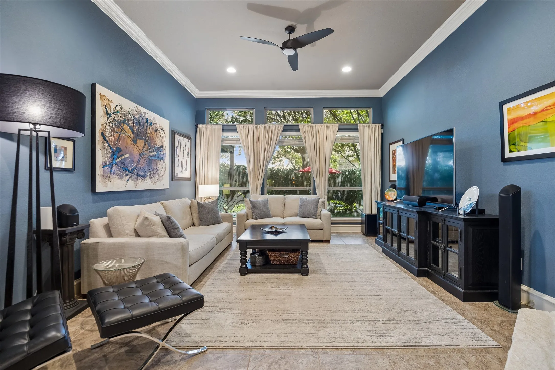 Large family/living area overlooking the backyard .