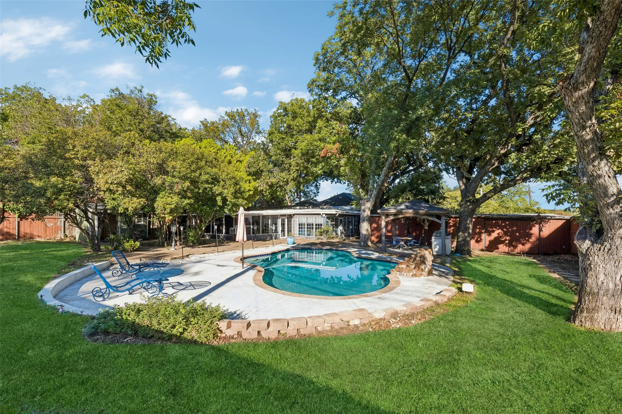 Sprawling double lot with sparkling pool