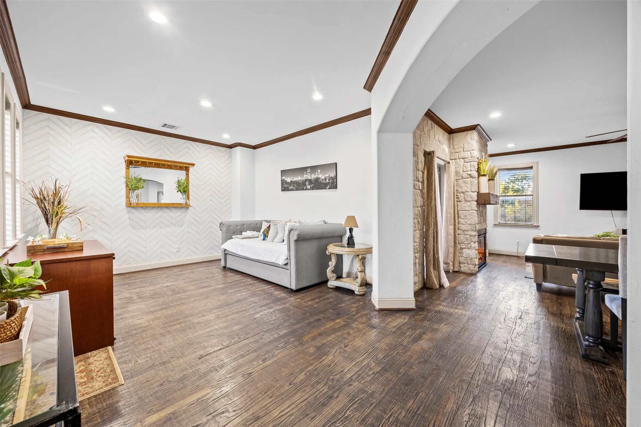 View from the stairs of the family/game room and living room on level 2