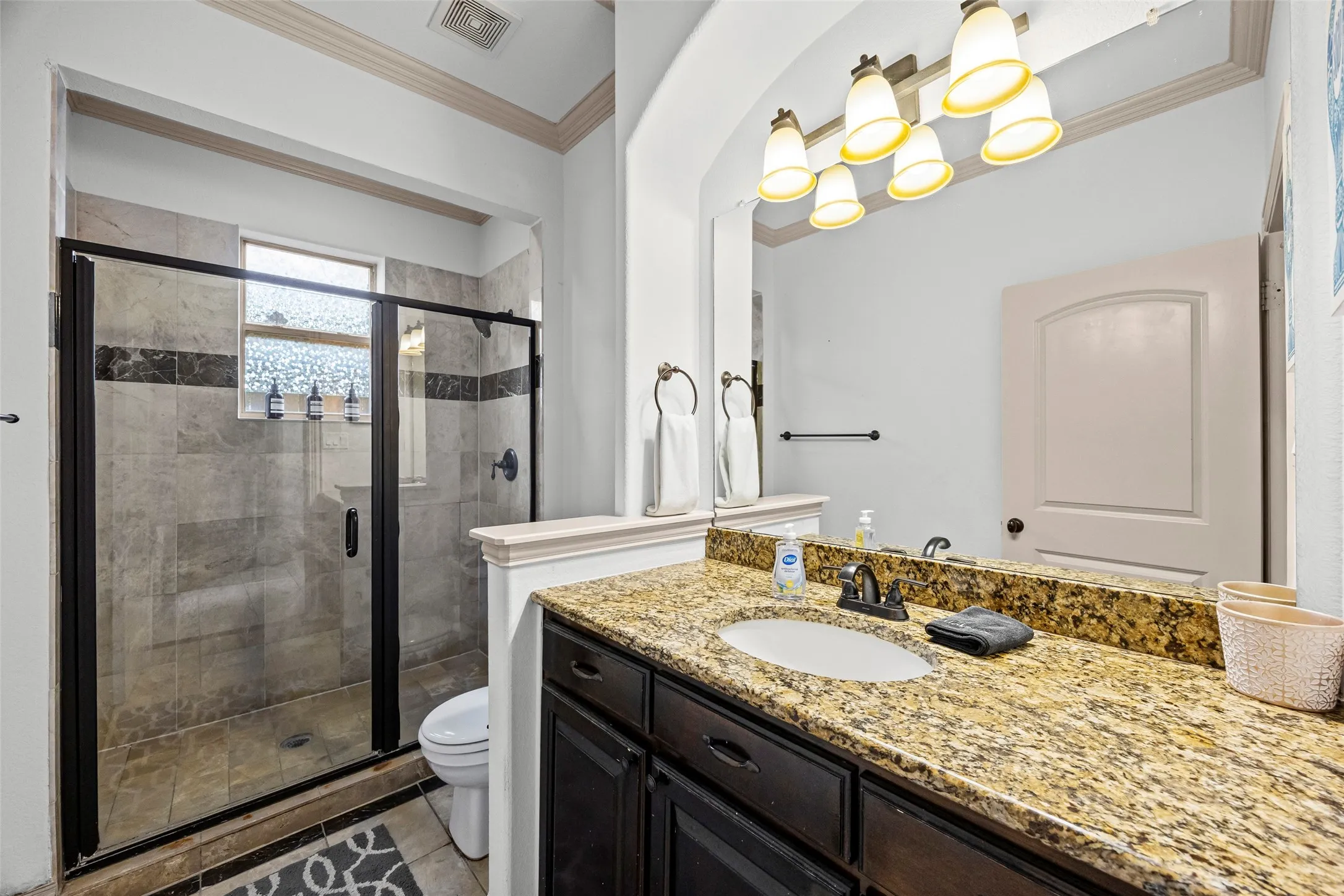 Full bathroom with shower on level 1