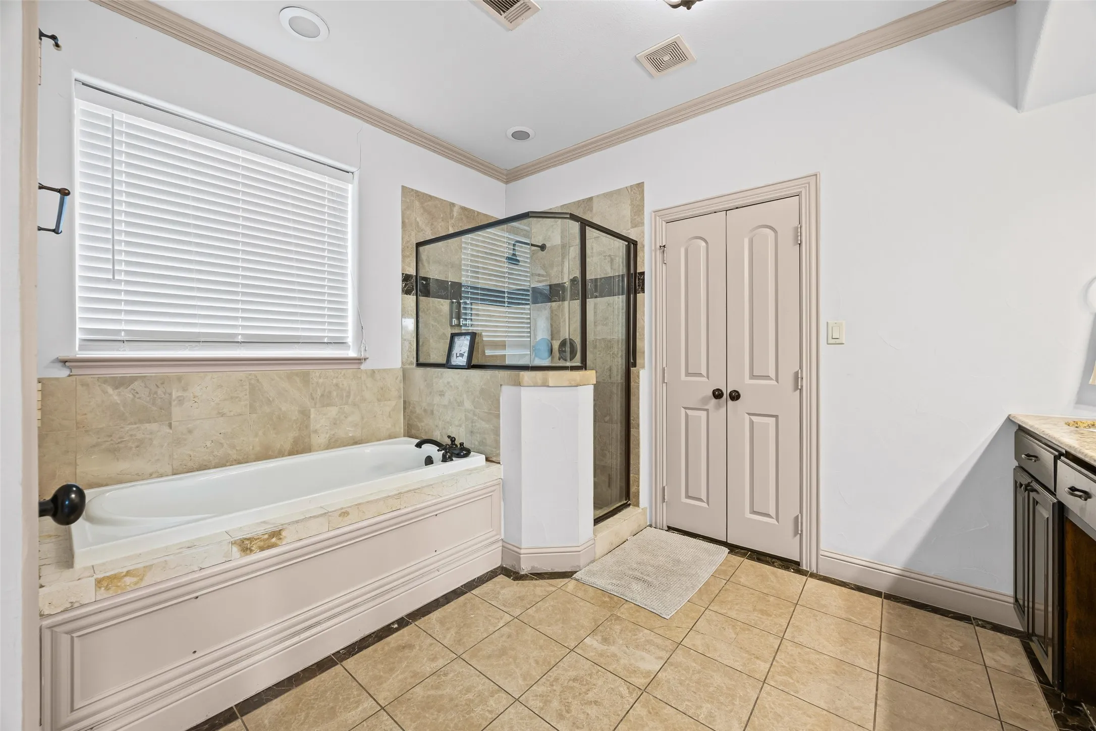 Primary bathroom #1 on level 3 with garden tub and separate shower