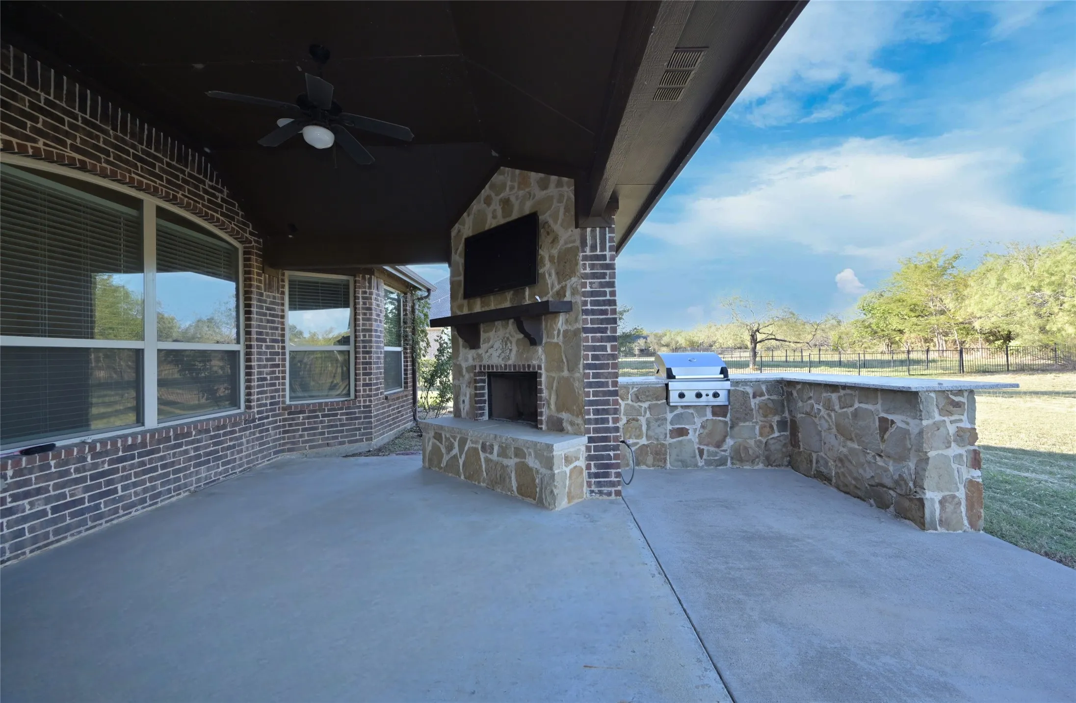 Built in Fireplace and Grill with Granite Serving Bar