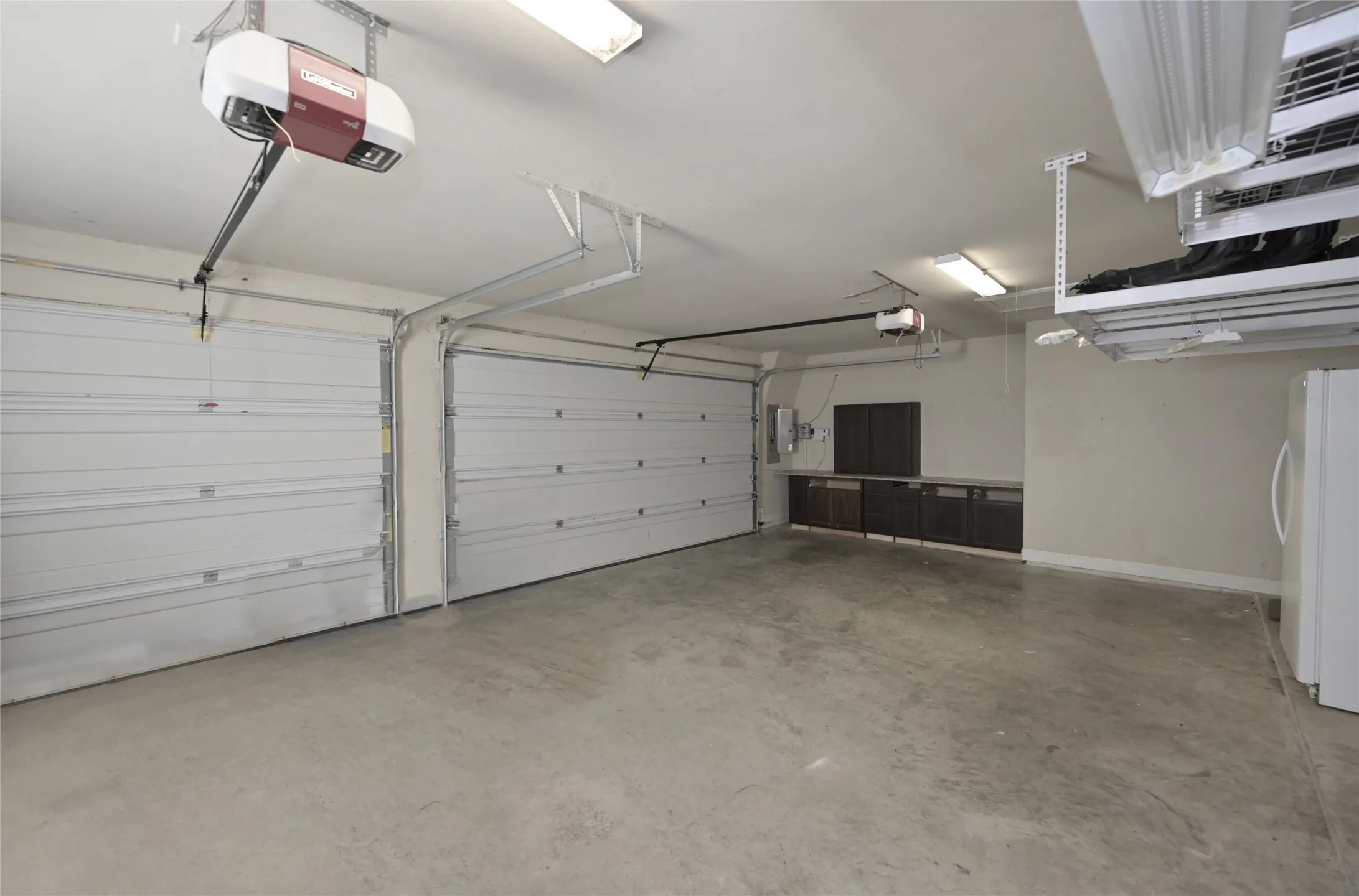 3 Car Garage with 2 tankless water heaters , full house water softener and side granite topped work bench