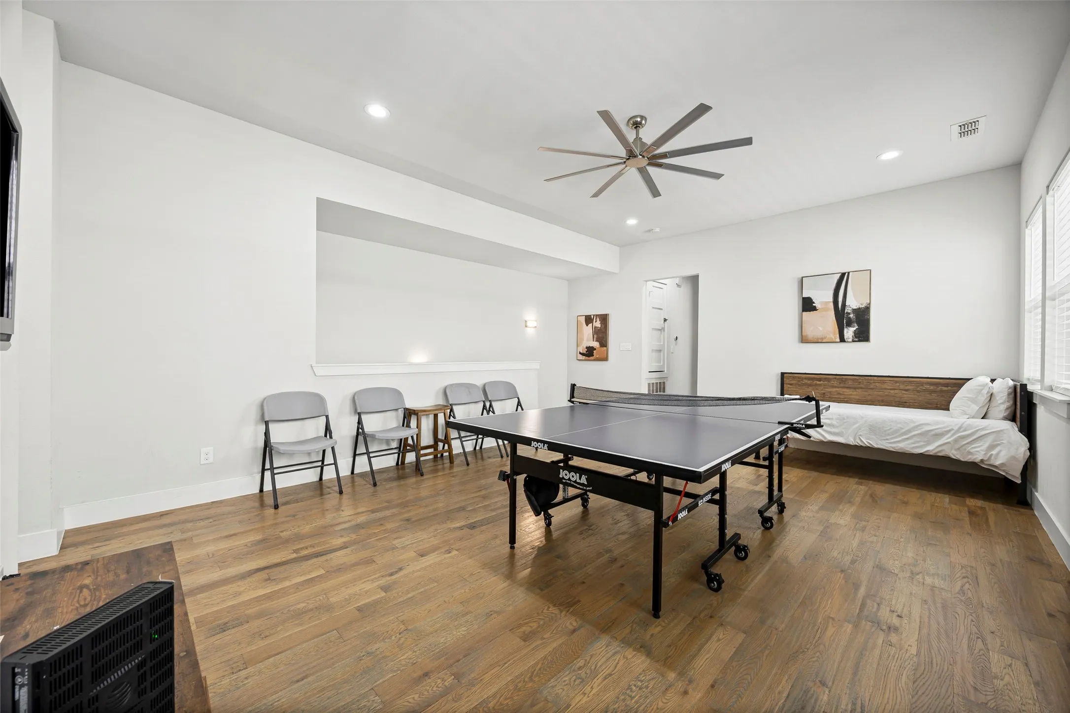 At the top of the stairs, you will find a large family room