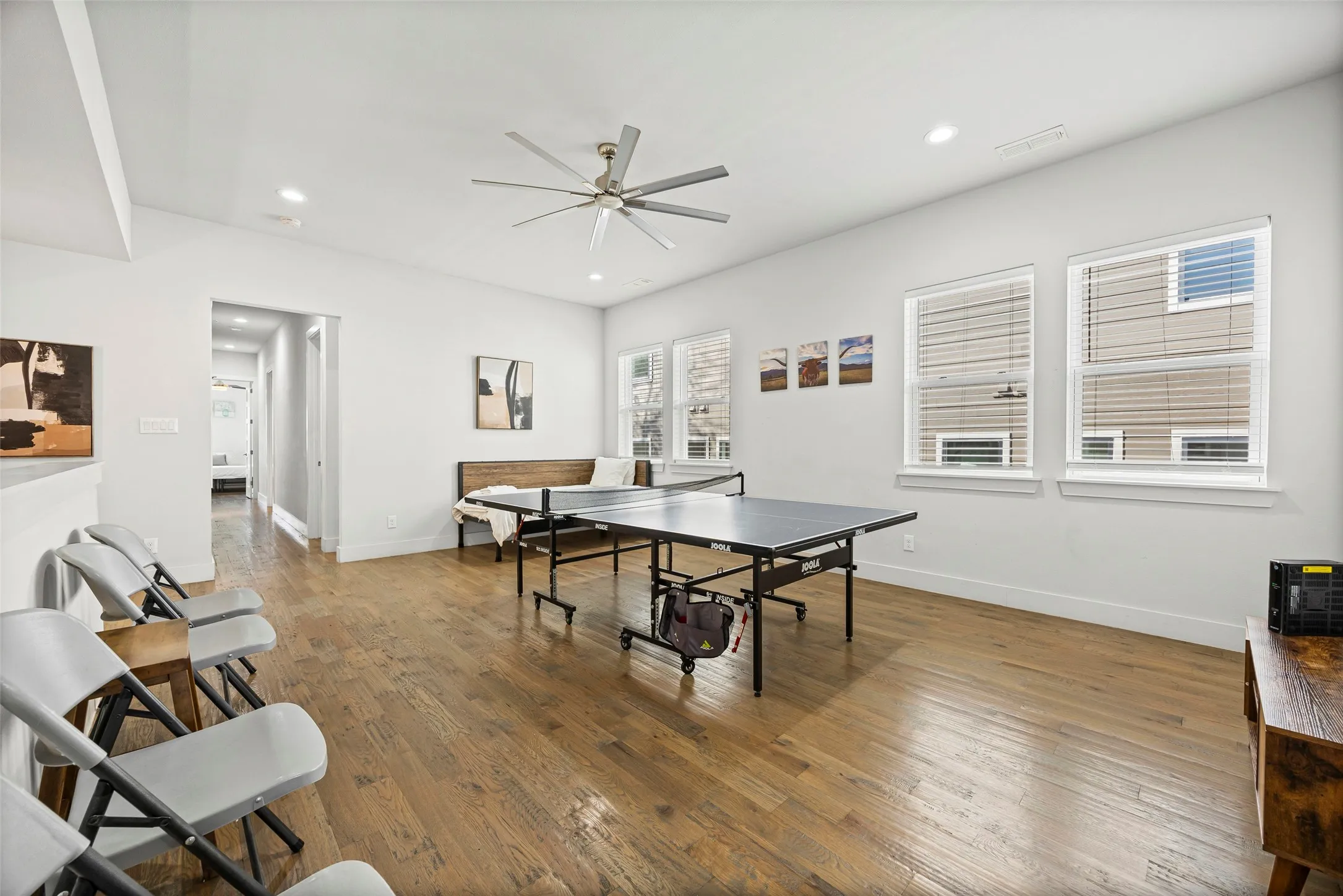 At the top of the stairs, you will find a large family room